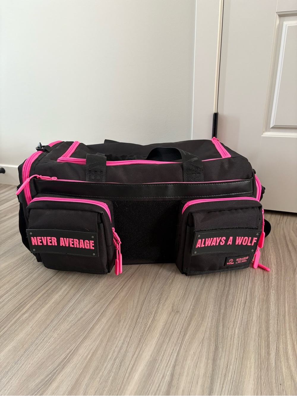 Wolfpack 30L Never Average / Always a Wolf Black & Pink Duffel Bag